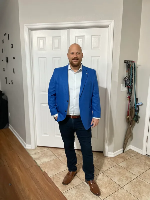 Jacob in a blue suit jacket