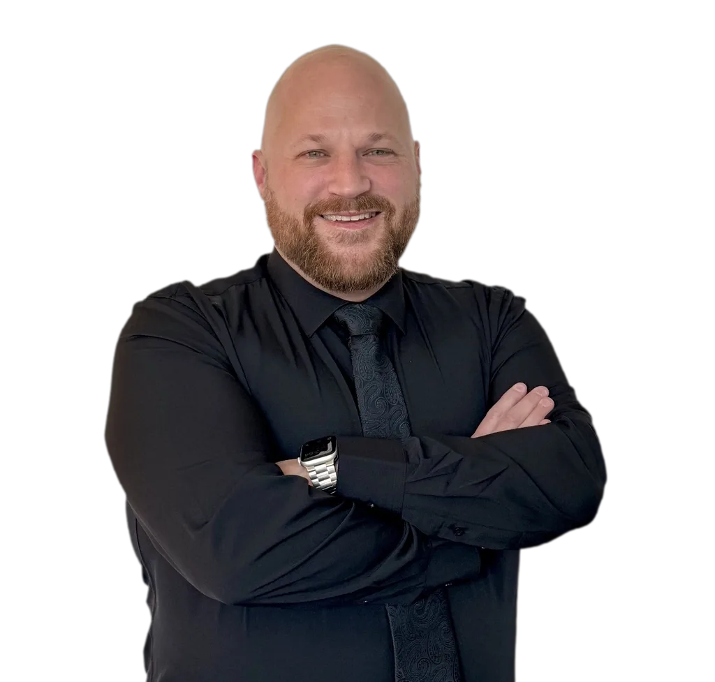 Jacob Putnam, arms crossed, smiling